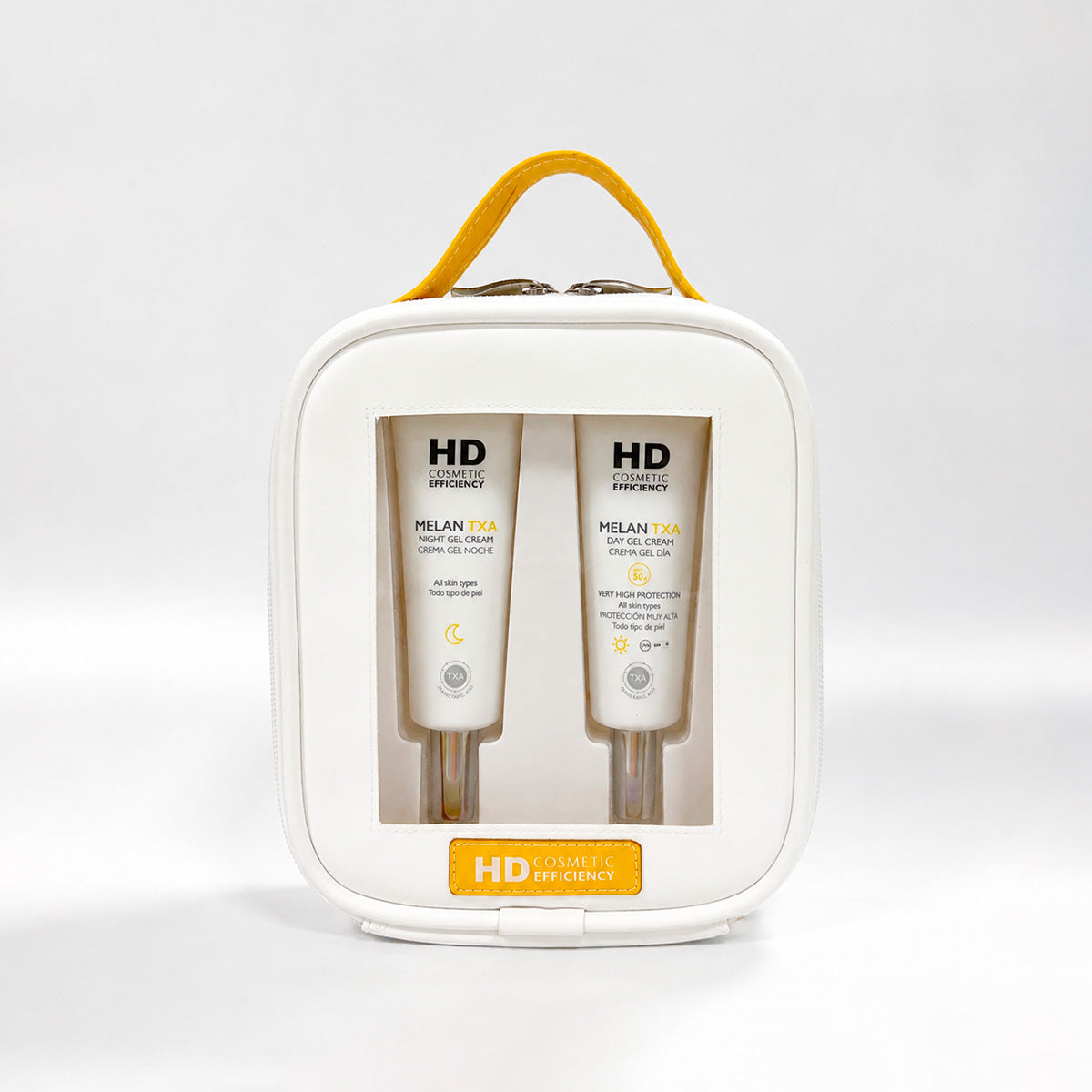 HD Melan TXA Kit Día SPF50+ y Noche en neceser de viaje — foto oficial